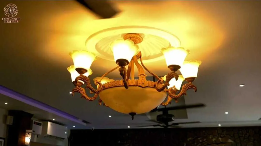Brass chandelier above the Byanjan dining hall